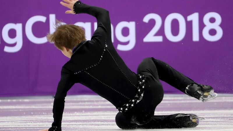 All shook up: Russian skater Mikhail Kolyada hits the ice during his Elvis routine in the men’s singles free skate at the 2018 Winter Olympics  in Gangneung, South Korea, on Monday. Photograph: Chang W Lee/New York Times