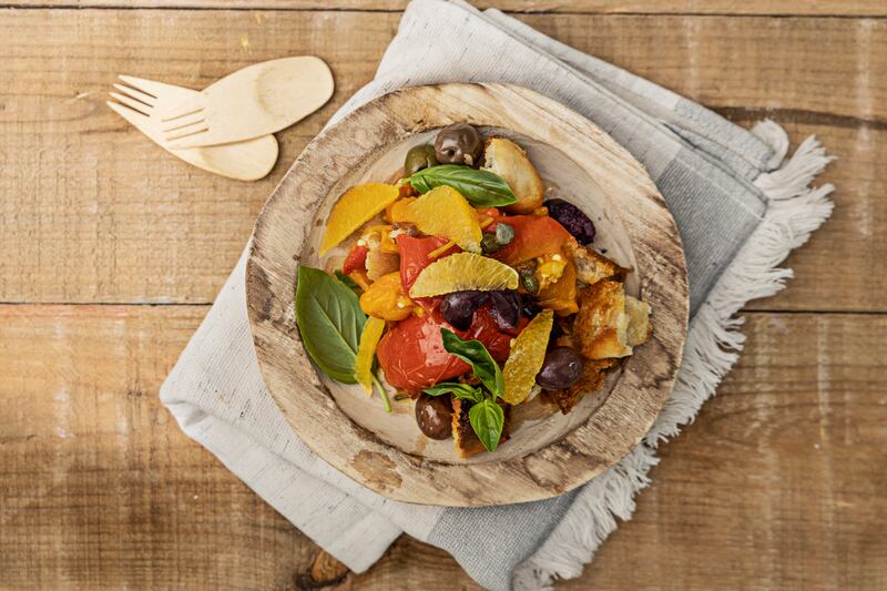 Pared down panzanella, where the bread soaks up the roasting juices of the peppers.