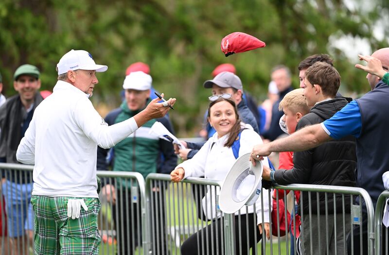 Ian Poulter of England returns a signed hat to a spectator at the JP McManus Pro-Am at Adare Manor. Photograph: Ross Kinnaird/Getty