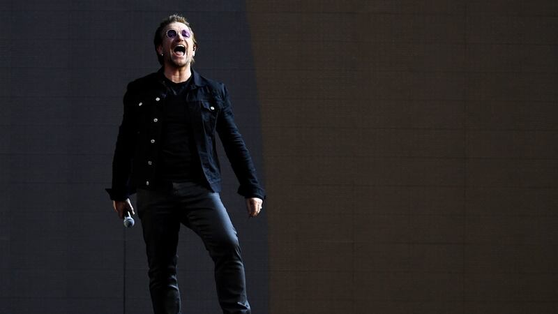 Bono sings as U2 perform during their U2: The Joshua Tree Tour, at Twickenham Stadium, London, Britain, July 8, 2017. REUTERS/Dylan Martinez