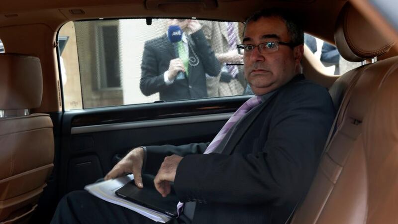 Cyprus Central Bank Governor Panicos Demetriades leaves the presidential palace in Nicosia today. The European Central Bank set Cyprus a Monday deadline to agree a bailout plan, threatening to cut off funding to the islands' cash-strapped banks if a program is not agreed by then with the EU and the IMF. Photograph: Yorgos Karahalis/Reuters