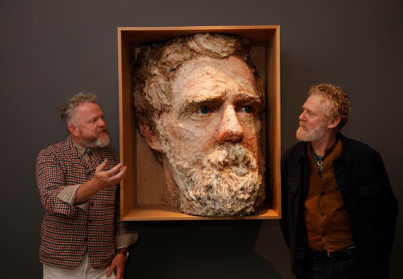 Colin Davidson with the subject of his award winning artwork Glen Hansard. Photograph: Alan Betson 

