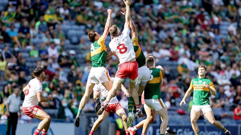 Kerry’s Jack Barry challenges Tyrone’s Brian Kennedy. Photograph: Laszlo Geczo/Inpho