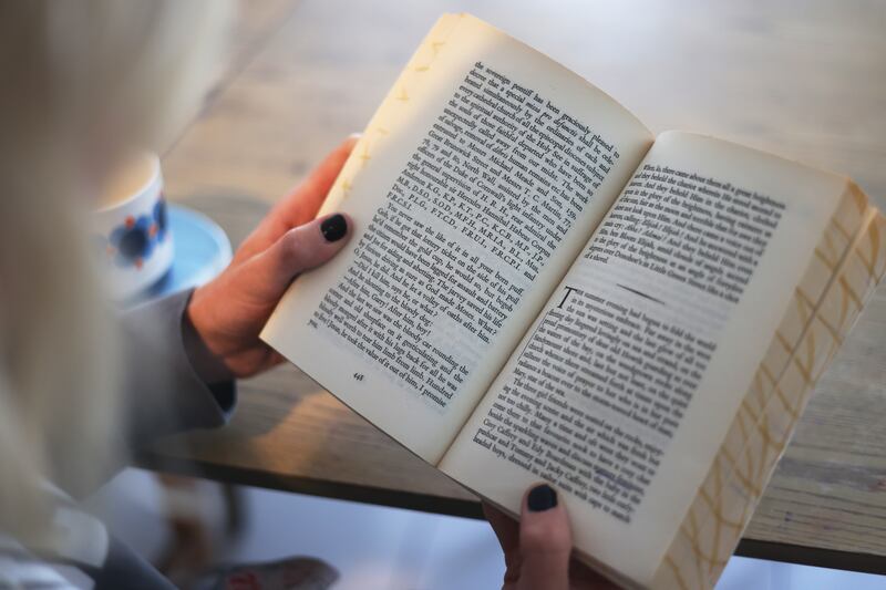 Author Maggie Armstrong with her copy of Ulysse’ by James Joyce. She has been reading a few pages a night since January of this year. Photograph: Bryan O’Brien