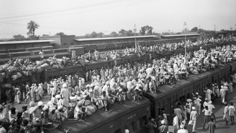 Indian refugees crowd on to trains as a result of the creation of two independent states, India and Pakistan, in 1947. Muslims flee to Pakistan and Hindus flee to India in one of the largest transfers of population in history. Photograph: Getty Images