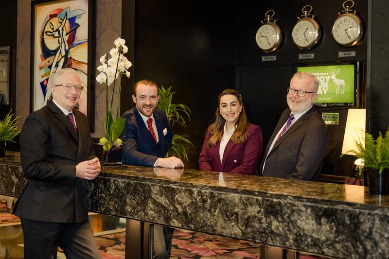 Jamie Skehan, second from left, with staff at the Ashling Hotel in Parkgate Street