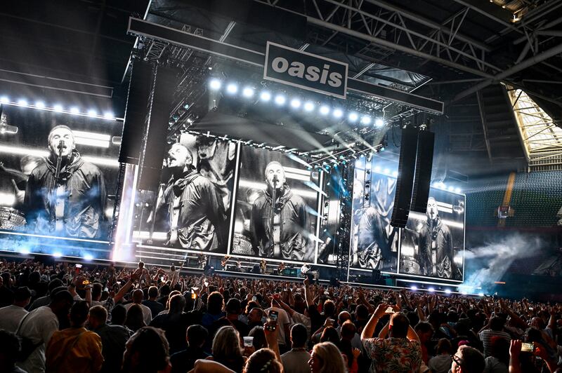 Oasis perform on stage during the opening night of their Live 25' Tour at the Principality Stadium in Cardiff, Wales. Photo: Gareth Cattermole/Getty Images