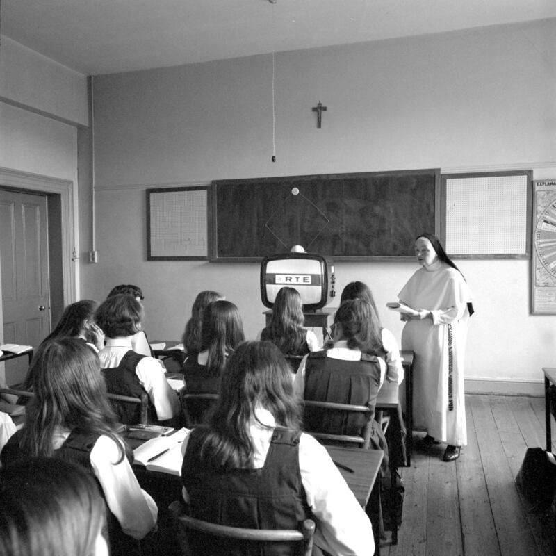 1968: Schoolgirls and their teacher waiting to watch an episode of Telefís Scoile at the Domincan College, Muckross Park, Dublin. Photograph: Dakki Heuvelink/RTÉ