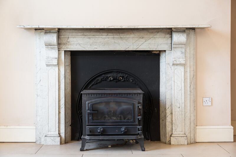 The house retains period fireplaces