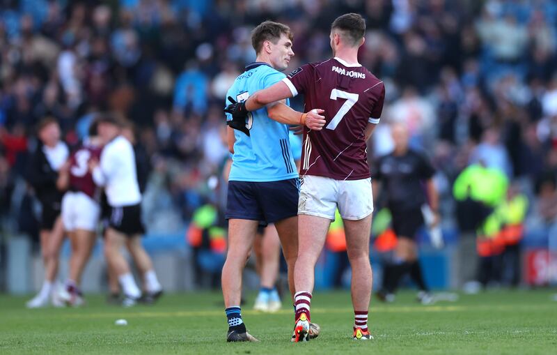 Dublin’s Michael Fitzsimons and Séan Mulkerrin of Galway following the All-Ireland quarter-final at Croke Park. Photograph: James Crombie/Inpho 