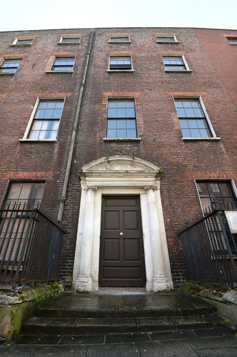 The rundown exterior of the former tenament building at 14 Henrietta Street, Dublin, pictured in 2015 before it was turned into a museum. Photograph: Dara Mac Dónaill