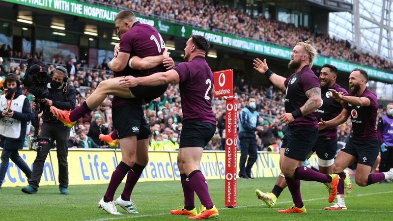 Sexton celebrates with Andrew Conway after scoring a try. Photo: Peter Morrison/AP Photo