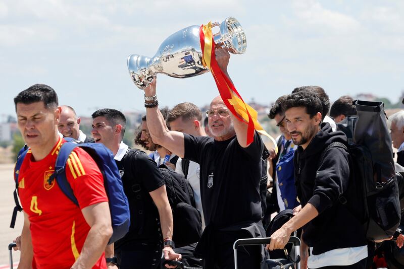 Spanish national football team head coach Luis de la Fuente holds the Euro 2024 trophy. Photograph: Oscar Del Pozo/AFP via Getty
