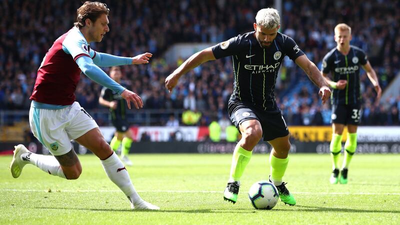 Jeff Hendrick challenges Sergio Aguero during Burnley’s clash with Manchester City. Photograph: Clive Brunskill/Getty
