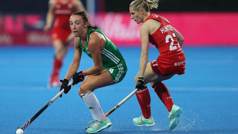 Ireland’s Yvonne O’Byrne  turns away from Jo Hunter of England during the Pool B game. Photograph: Christopher Lee/Getty Images