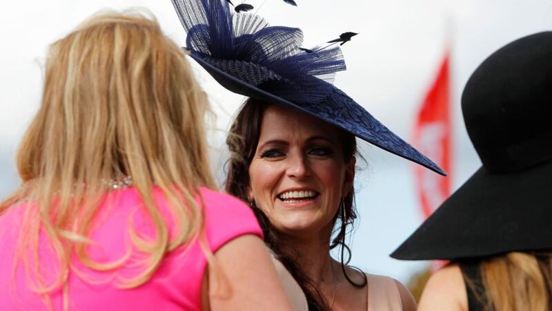 Face in the crowd: Racegoers during the Ladbrokes World Series Hurdle Day.  Photograph:  Brian Lawless/PA