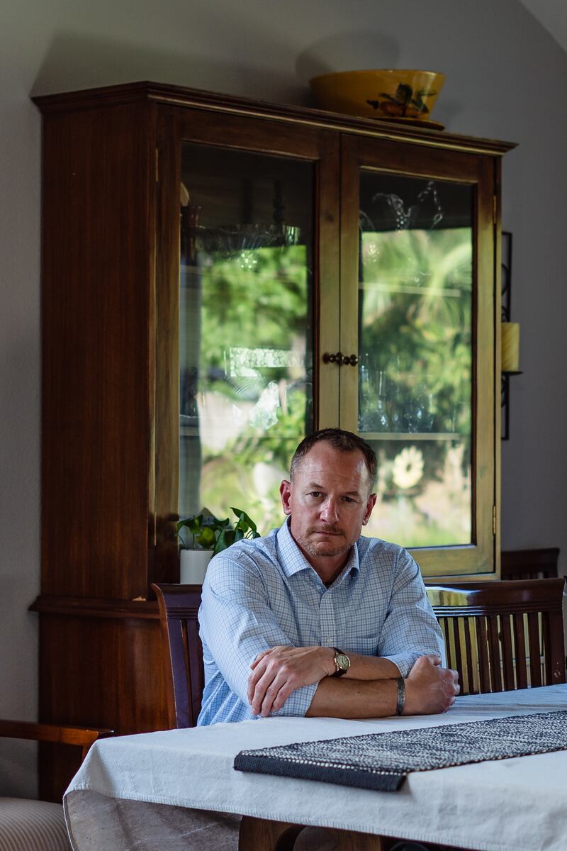 Retired marine Col Seth WB Folsom, who lost a marine under his command to an unexploded American cluster munition while they were on patrol during the war in Iraq, at his home in Oceanside, California. Photograph: Ariana Drehseler/New York Times
                      