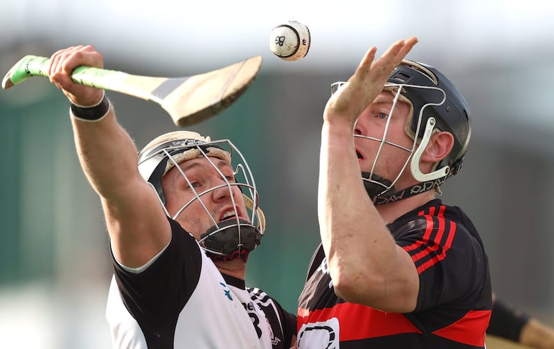 Kilruane MacDonaghs' Sean McAdams and Philip Mahony of Ballygunner challenge for the ball during the Munster SHC quarter-final at Walsh Park. Photograph: Tom Maher/Inpho 