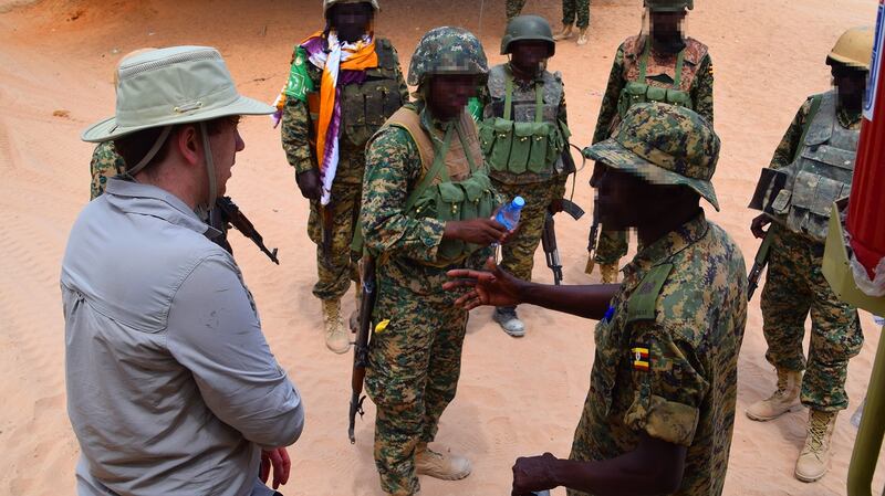 VRAI creative director Noel Campion briefs African Union troops in Somalia.