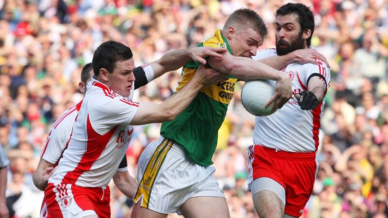 Kerry’s Tommy Walsh is tackled by Conor Gormley and Joe McMahon in the 2008 final. Photograph: Cathal Noonan/Inpho