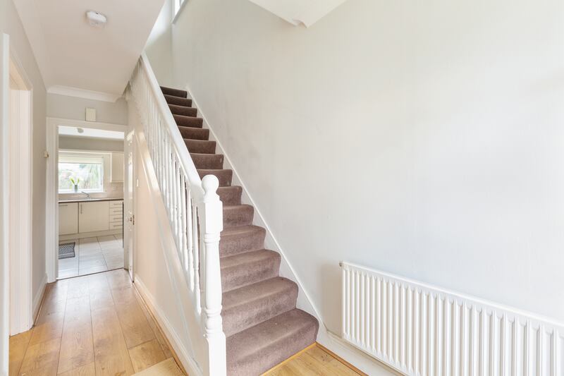 The hallway leading upstairs