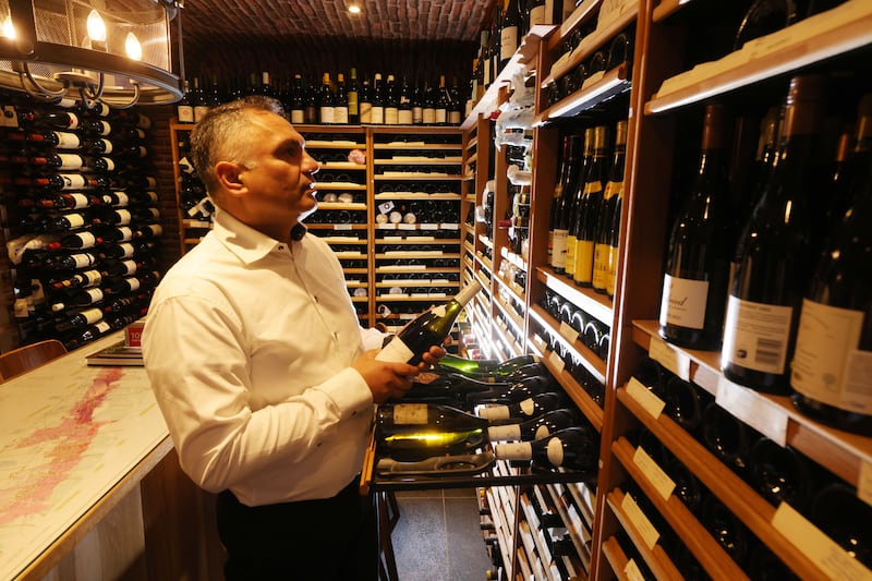 Shiva Gautam in the excellent wine cellar of Monty’s of Kathmandu. Photograph: Alan Betson