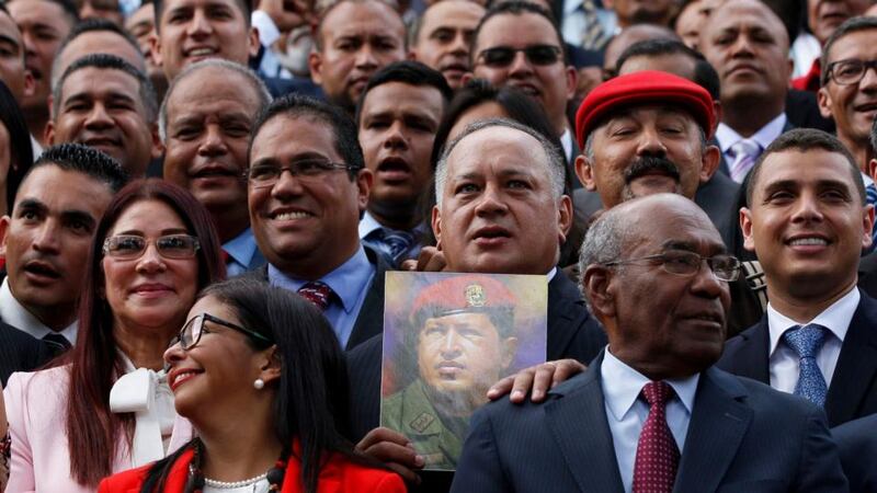 Venezuelan assembly: first lady Cilia Flores (left, in pink) and Delcy Rodríguez (front left, in red) at the swearing-in of the new body on Friday. Photograph: Ariana Cubillos/AP