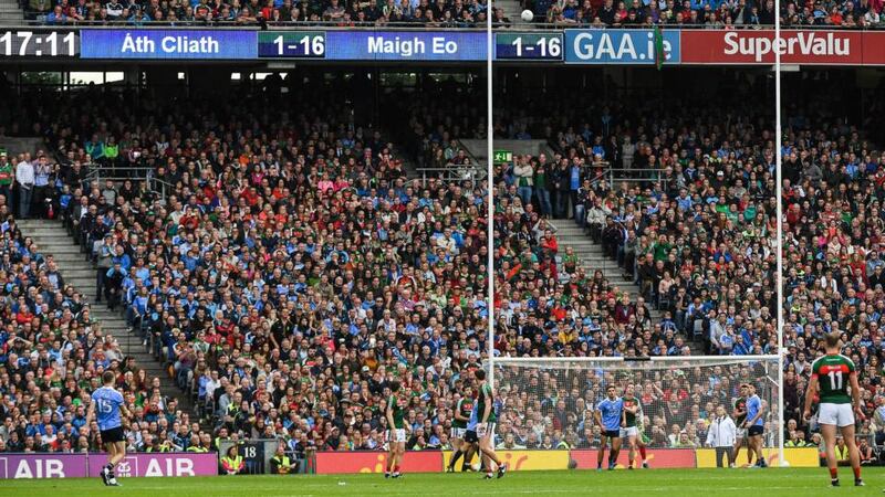 Dean Rock of Dublin kicks the winning point against Mayo. Photograph:  Ray McManus/Sportsfile via Getty Images