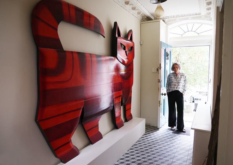 Ruth Mathers at her home with a Graham Knuttel artwork. Photograph: Bryan O’Brien