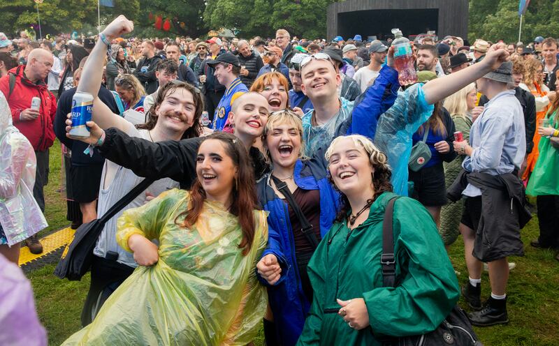 All Together Now 2024: Festivalgoers enjoy themselves despite the poor weather. Photograph: Gareth Chaney 

