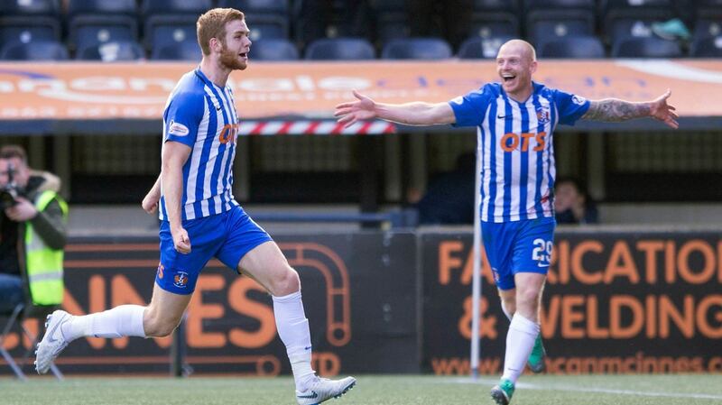 Stuart Findlay (left) celebrates scoring Kilmarnock’s winner against Celtic. Photograph: Jeff Holmes/PA