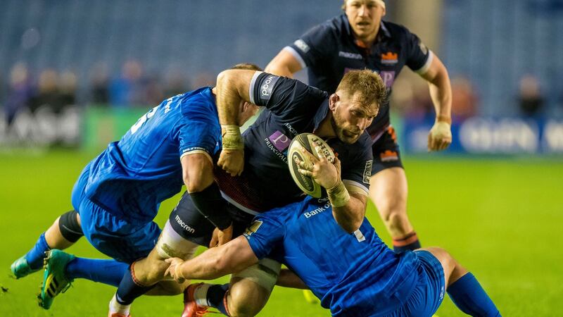 Edinburgh’s John Barclay is tackled by Rhys Ruddock and Ed Byrne during his side’s win over Leinster. Photograph: Craig Watson/Inpho