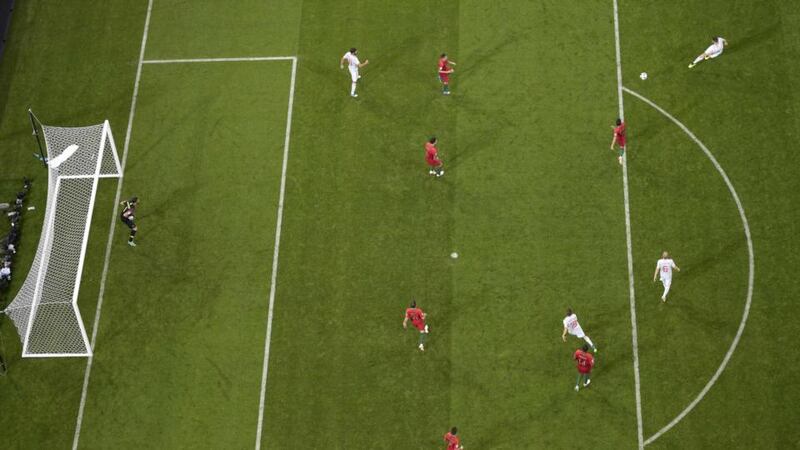 Spain Nacho Fernandez scores his side’s third goal in the World Cup Group B match against Portugal  at the Fisht Stadium in Sochi. Photograph: Jonathan Nackstrand/AFP/Getty Images