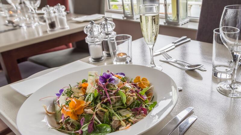 Confit chicken salad with lambs lettuce, carrot, cucumber, sourdough croutons, mixed seeds and an aioli dressing at Man Friday
