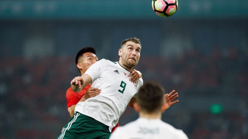Sam Vokes scored a brace during Wales’ 6-0 win in China. Photograph: Reuters