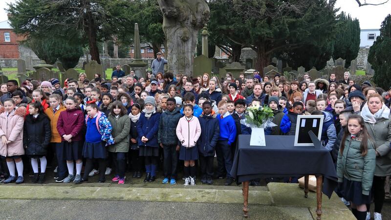 Inchicore locals attending  the unveiling of a headstone for eight-year-old Eugene Lynch, one of the 40 children killed during the 1916 Easter Rising. Photograph: Colin Keegan/Collins.