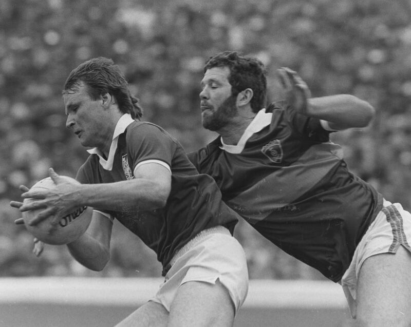 Teddy McCarthy in action for Cork against Kerry's Eoin Listen. As early as 1989 McCarthy said he'd have to choose between both codes, but he couldn't and persevered in both for a decade. Photograph: Billy Stickland/Inpho 