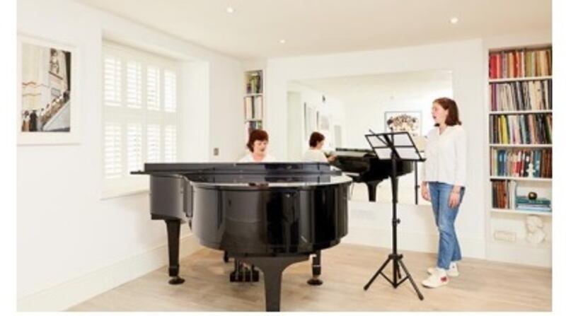 The music room which has been knocked through to the kitchen. Photograph: Philip Lauterbach