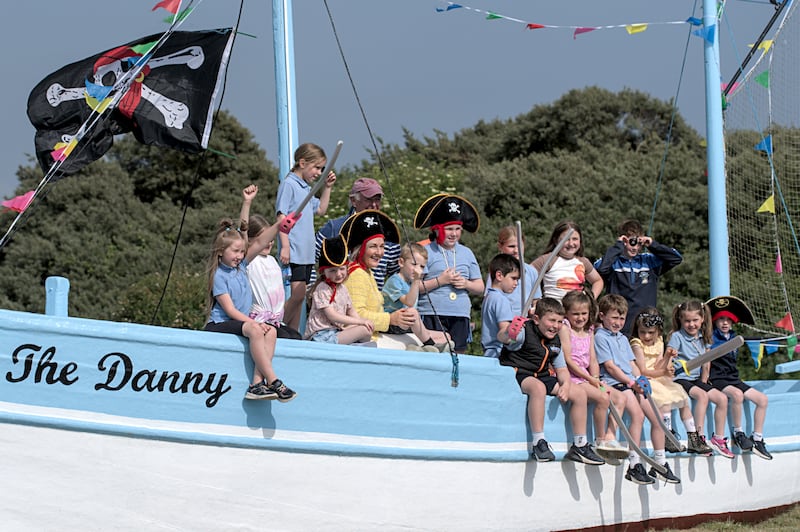 Ceann Comhairle Verona Murphy TD launching the 2025 Duncannon Festival with the help of some of "pirate" pupils from St. Oliver's Primary School on board "The Danny" fishing boat on display at the entrance to the Wexford seaside village. The one-day festival is to take place on Saturday, 26th July. Photograph: Dave Sones.