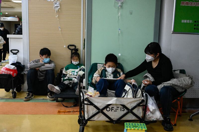 Children receiving a drip at a children hospital in Beijing. The international news was full of reports of pneumonia affecting children in northern China, although the Chinese media had much less to say about it. Photograph: Jade Gao/AFP