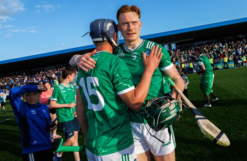 Limerick’s David Reidy and William O'Donoghue celebrate victory against Waterford in the Munster SHC. Photograph: James Crombie/Inpho