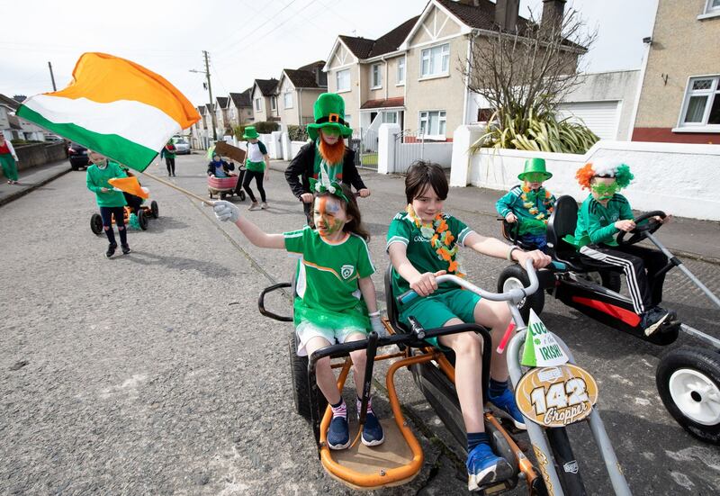 Children of the Irish Estates in Corbally, Limerick, treat residents of the area to an impromptu St Patrick's Day parade. Photograph: Alan Place