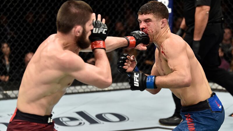 Khabib Nurmagomedov punches Al Laquinta in their lightweight title bout during the UFC 223 event. Photo: Jeff Bottari/Zuffa LLC/Zuffa LLC via Getty Images
