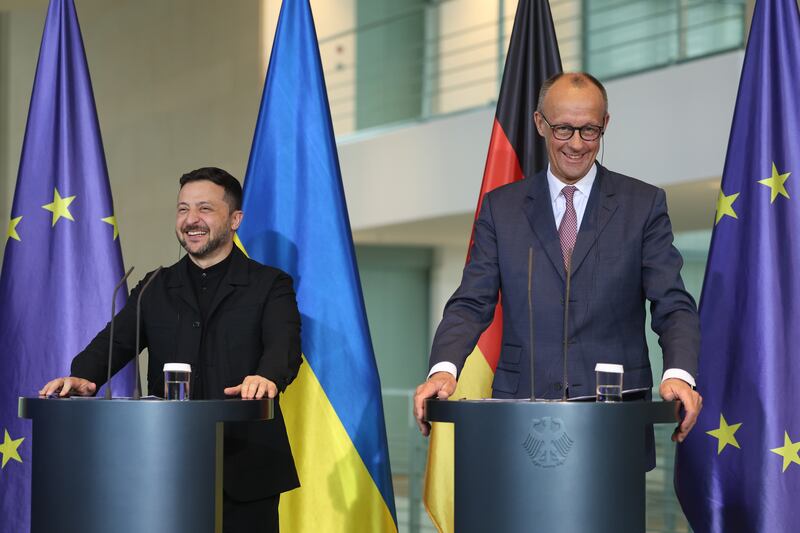 Ukrainian president Volodymyr Zelenskiy and German chancellor Friedrich Merz speak to the media following talks at the Chancellery in Berlin, Germany. Photograph: Sean Gallup/Getty Images