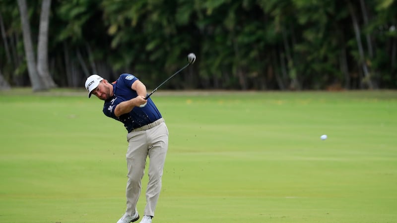 Graeme McDowell plays a shot on the ninth hole during the third round of the Sony Open in Hawaii at the Waialae Country Club in Honolulu, Hawaii. Photograph: Cliff Hawkins/Getty Images