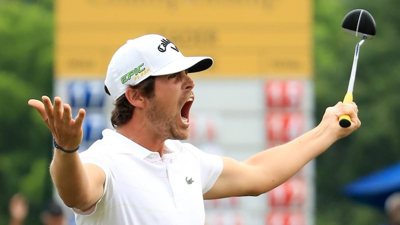 Nacho Elvira reacts after holding  his putt on the 18th green to force a playoff with Scott Hend  at the Maybank Championship. Photograph: Andrew Redington/Getty Images