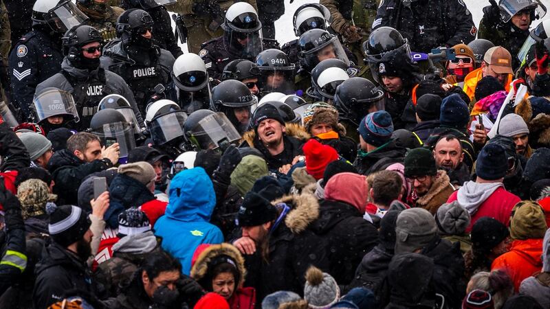 Police and demonstrators clash on Saturday in Ottawa, Canada. Photograph: Andrej Ivanov/AFP via Getty Images