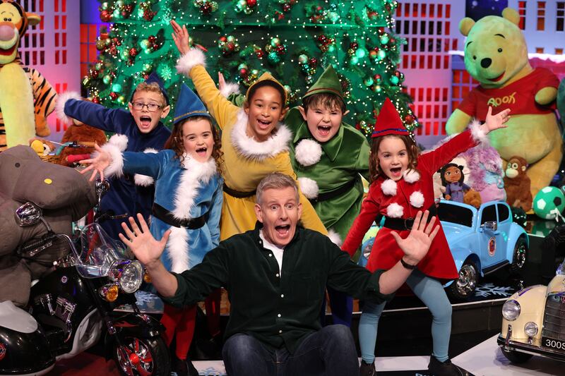 Patrick Kielty, prepares to host his first Late Late Toy Show, as he is pictured with Danny Sheehan age 8 (dark blue) Wexford, Poppy Madden (light blue) age 6 Carlow,  Darcy Ramsbottom (red) age 6 Carlow,  Layla Ibegu (yellow) age 10 Carlow and  Kyle Deane (green) age 8 Carlow. Photograph: Dara Mac Dónaill / The Irish Times







