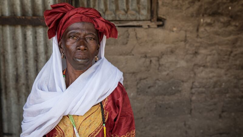 Fadou Drammeh (66), who says she was forced to confess to killing her own child during Yahya Jammeh’s 2009 witch hunts in Sintet, western Gambia. Photograph: Sally Hayden