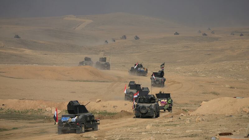 Counter-terrorism service troops advance towards Ghozlani military complex, south of Mosul, Iraq. Photograph: Alaa Al-Marjani/Reuters